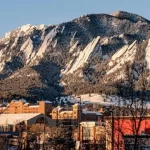 Colorado Mountain with cannabis buildings next to it