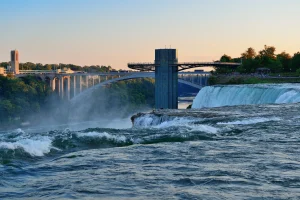 Image of Niagara Falls during a sunset, from the top of the falls