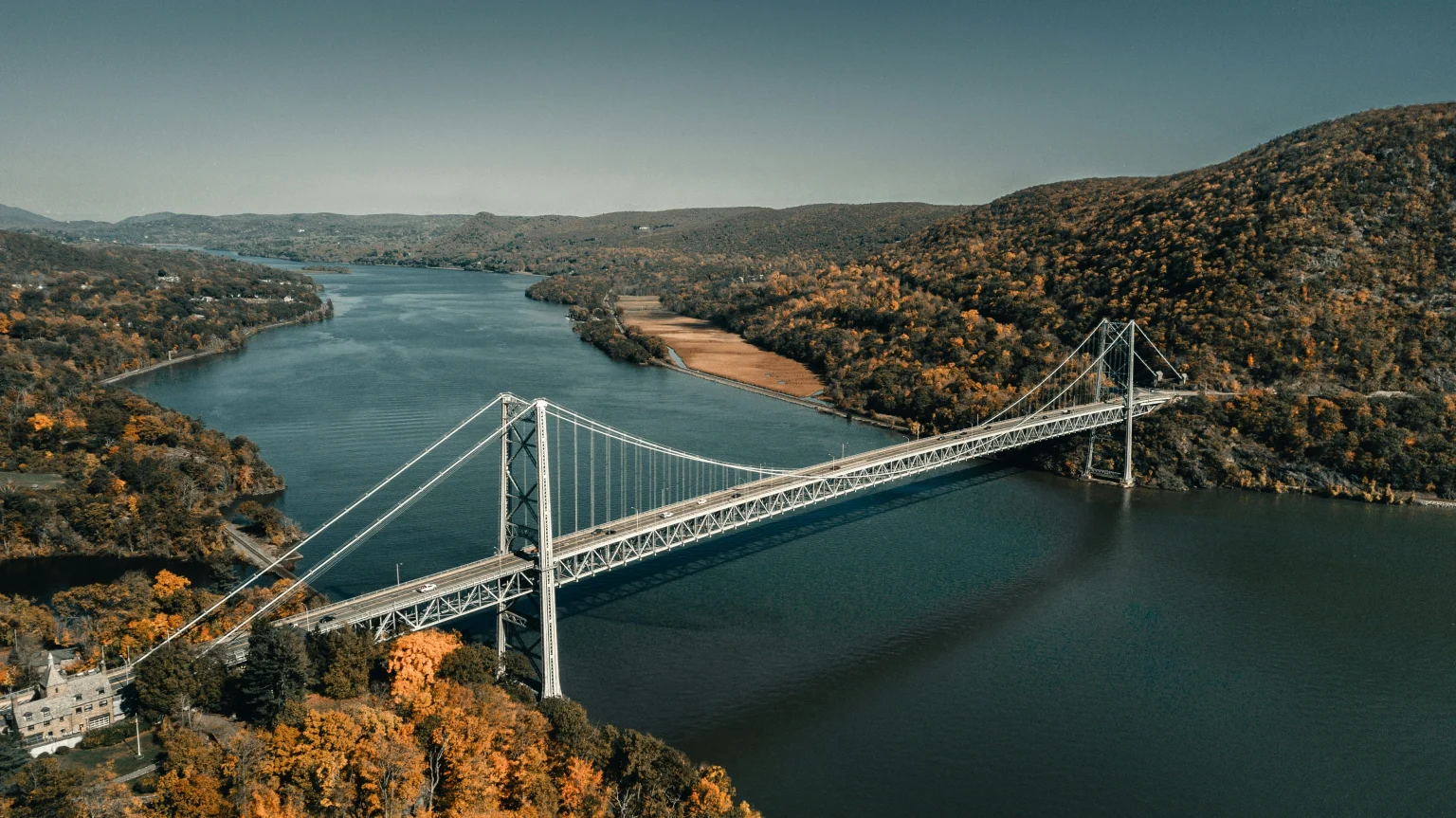 Upstate New York bridge over a valley and a river in the fall