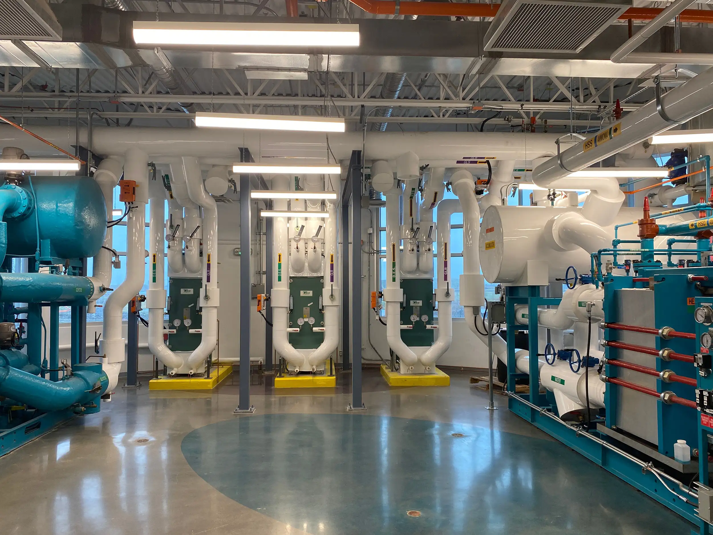Industrial cGMP compliant HVAC infrastructure and utility piping in a commercial cannabis processing facility.